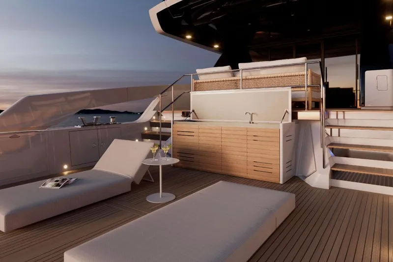 Slide: The Image of Luxurious 2026 Sanlorenzo SX76 yacht deck with lounge chairs and sunset view. - 10