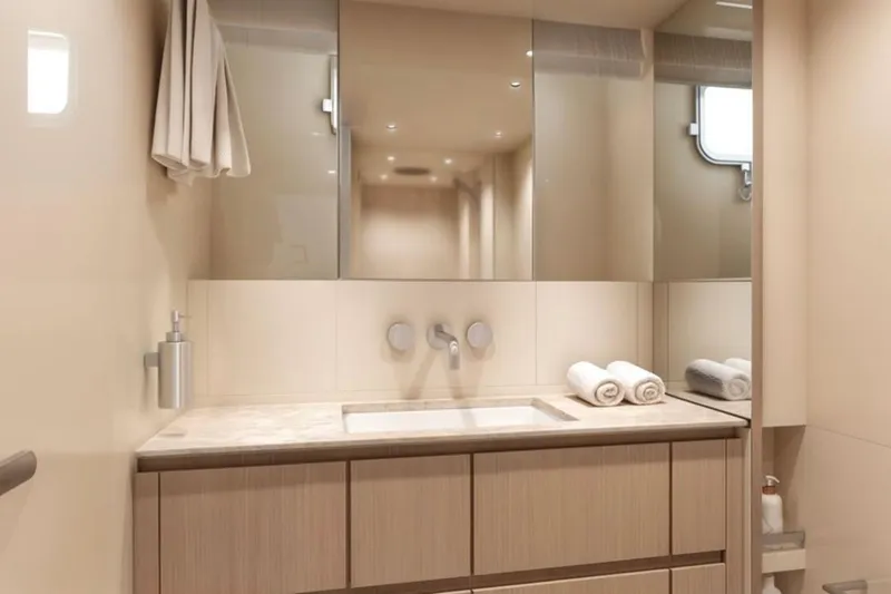 Slide: The Image of Luxurious bathroom in 2026 Sanlorenzo SX76 yacht with modern fixtures and elegant design. - 17