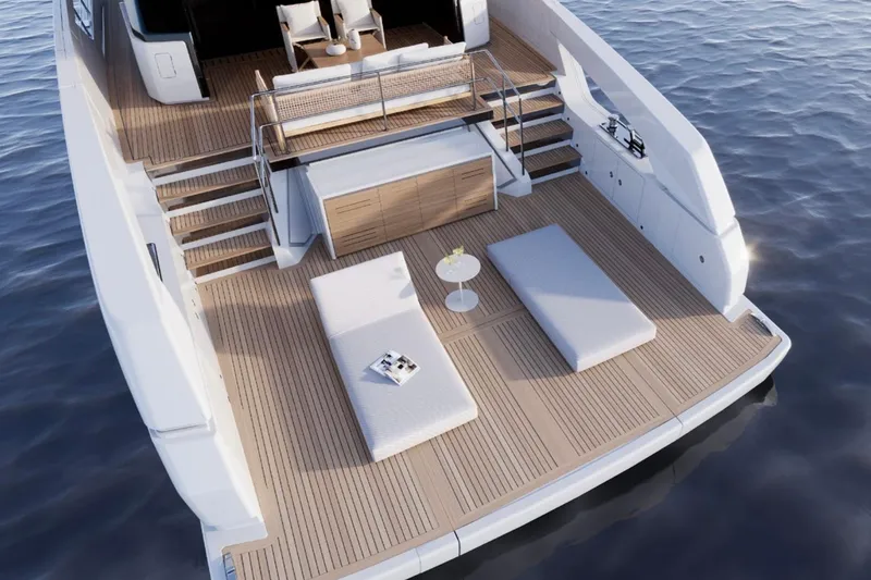 Slide: The Image of Luxurious 2026 Sanlorenzo SX76 yacht deck with sun loungers and elegant seating area. - 6