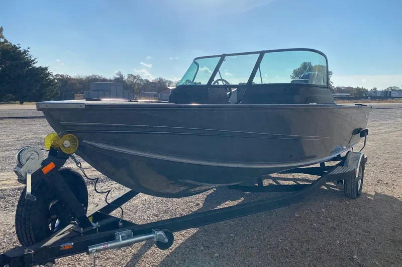 Slide: The Image of 2026 G3 Angler V18 FS boat on trailer in outdoor setting. - 3