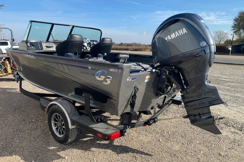 Slide: The Image of 2026 G3 Angler V18 FS boat with Yamaha outboard motor on a trailer. - 4