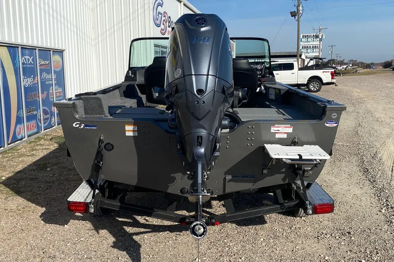 Slide: The Image of 2026 G3 Angler V18 FS boat with powerful outboard motor, parked outdoors. - 5