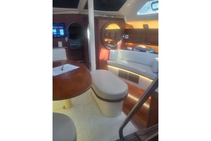 Slide: The Image of Interior of 1997 Hunter Passage 42 yacht with cozy seating and modern amenities. - 19