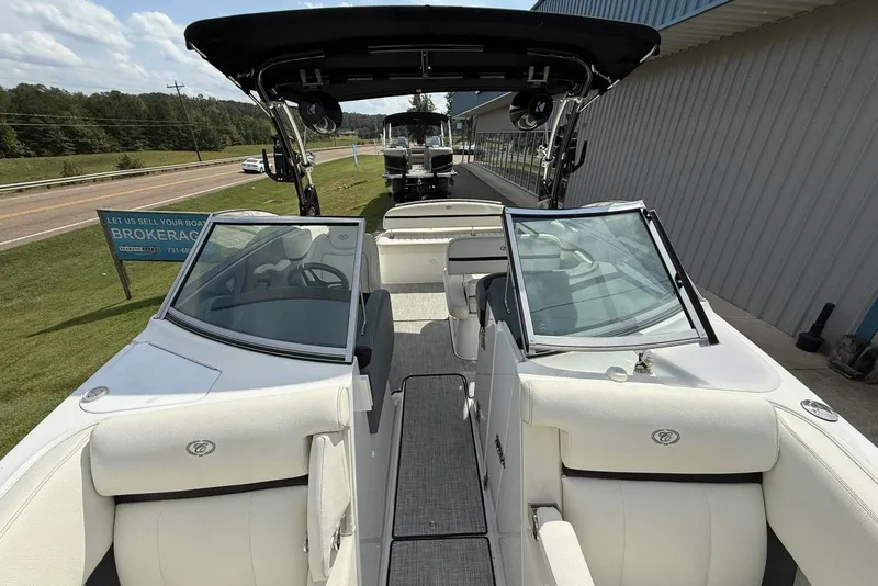 Slide: The Image of 2020 Cobalt R5 Surf boat with open cockpit and sleek design. - 16