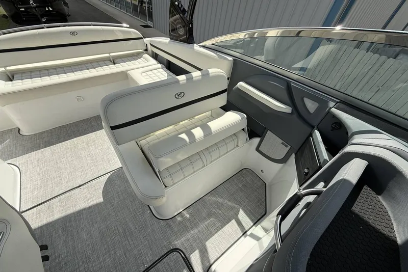 Slide: The Image of 2020 Cobalt R5 Surf boat interior with white seating and modern design. - 17