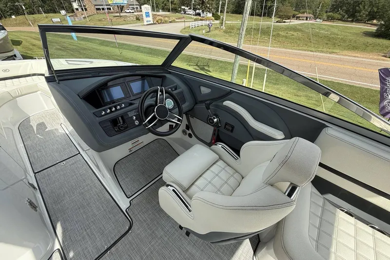 Slide: The Image of 2020 Cobalt R5 Surf boat interior with modern dashboard and steering wheel. - 20
