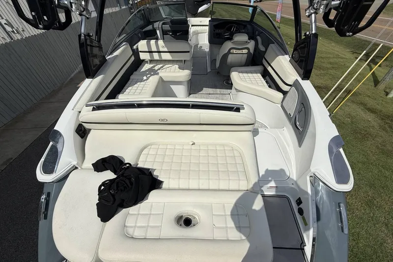 Slide: The Image of 2020 Cobalt R5 Surf boat interior with white seating and modern design. - 30