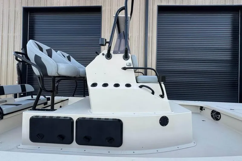 Slide: The Image of 2013 Majek 226 Illusion boat interior with seating and control console. - 4