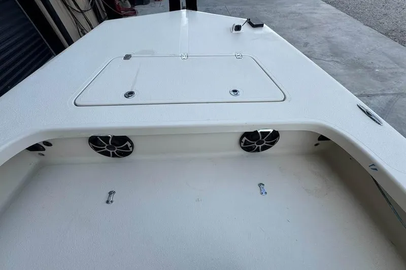 Slide: The Image of 2013 Majek 226 Illusion boat deck with storage hatch and speakers. - 6