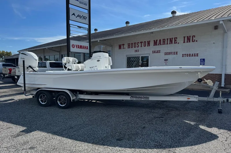 Slide: The Image of 2026 BlackJack 256 Bay boat on trailer at Mt. Houston Marine dealership. - 0