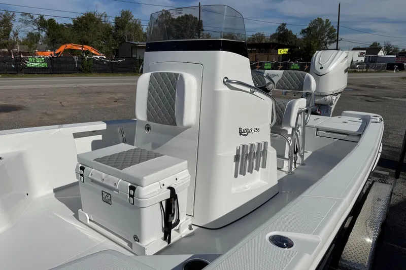 Slide: The Image of 2026 BlackJack 256 Bay boat with sleek design and modern seating. - 12