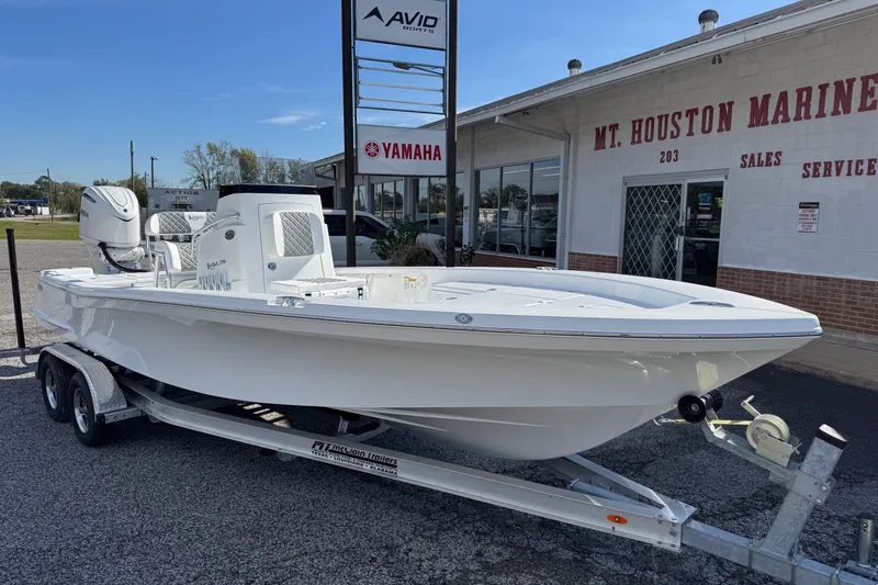 Slide: The Image of 2026 BlackJack 256 Bay boat on trailer at Mt. Houston Marine dealership. - 2