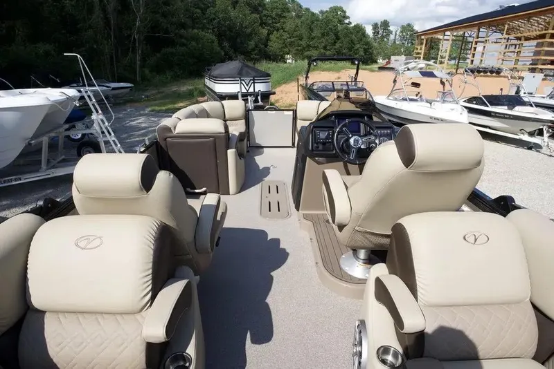 Slide: The Image of 2023 Veranda VP 22RC pontoon boat interior with luxurious seating and modern dashboard. - 10