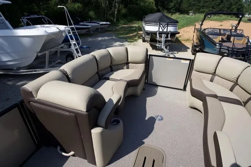 Slide: The Image of 2023 Veranda VP 22RC pontoon boat interior with plush seating and cup holders. - 5