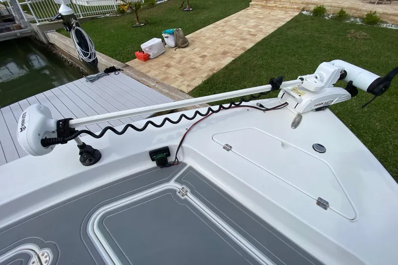 Slide: The Image of 2004 Palmetto 22 Excursion boat with Minn Kota trolling motor on deck. - 18