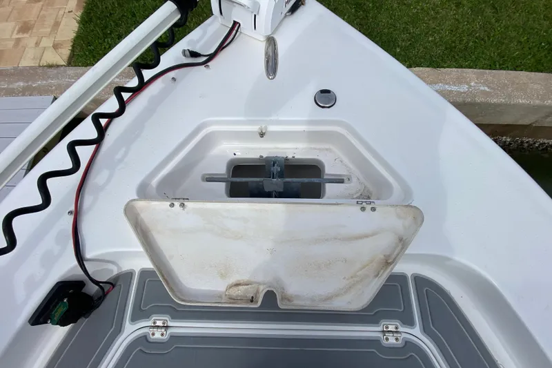 Slide: The Image of 2004 Palmetto 22 Excursion boat deck with open hatch and wiring. - 19