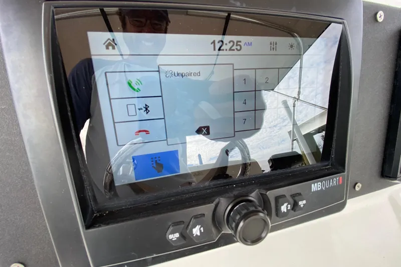 Slide: The Image of Touchscreen control panel on a 2004 Palmetto 22 Excursion boat, showing unpaired Bluetooth status. - 41
