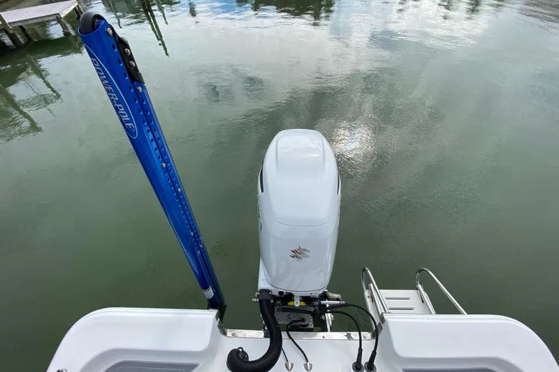 Slide: The Image of 2004 Palmetto 22 Excursion boat with Suzuki outboard motor on calm water. - 61