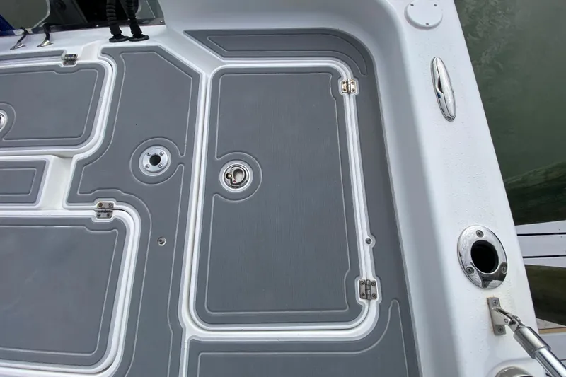 Slide: The Image of Deck of 2004 Palmetto 22 Excursion boat with gray non-slip surface. - 68