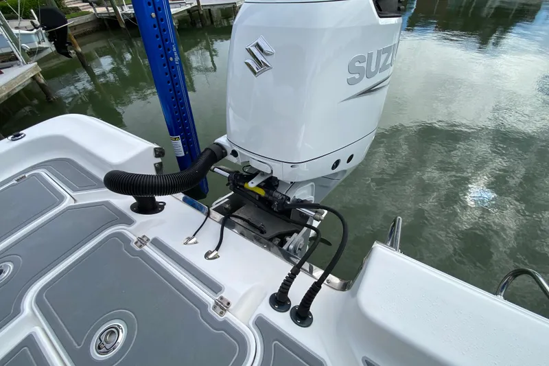 Slide: The Image of 2004 Palmetto 22 Excursion boat with Suzuki outboard motor at dockside. - 71