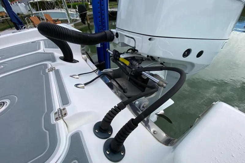 Slide: The Image of 2004 Palmetto 22 Excursion boat with motor and hydraulic steering system. - 73