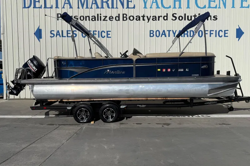The Image of 2017 Manitou 230 pontoon boat with Suzuki motor at Delta Marine Yacht Center. - 0