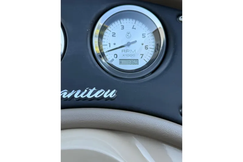 Slide: The Image of Close-up of 2017 Manitou 230 RPM gauge displaying 1360 RPM. - 24