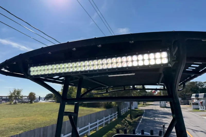 Slide: The Image of 2018 Shallow Sport 25 X3 boat with LED light bar on T-top. - 19