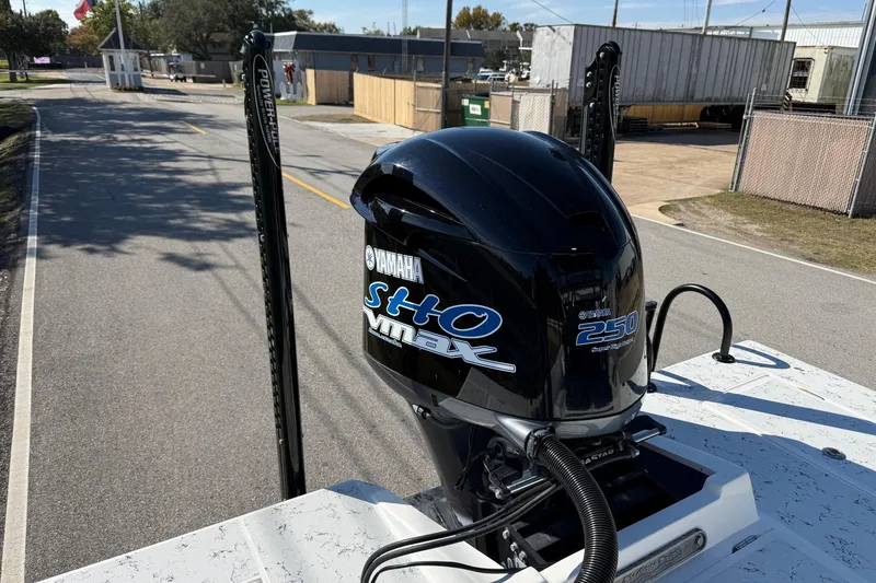 Slide: The Image of 2018 Shallow Sport 25 X3 with Yamaha 250 SHO outboard motor on a road. - 20