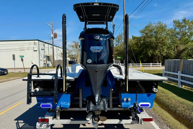 Slide: The Image of 2018 Shallow Sport 25 X3 boat with powerful 250 engine on trailer. - 3