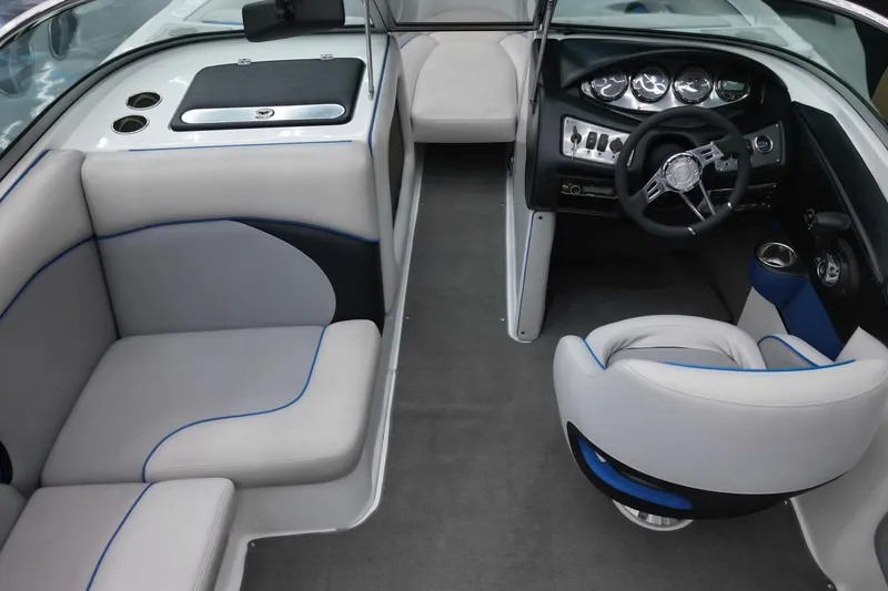 Slide: The Image of Interior of 2012 Supreme V226 boat with modern seating and dashboard design. - 8