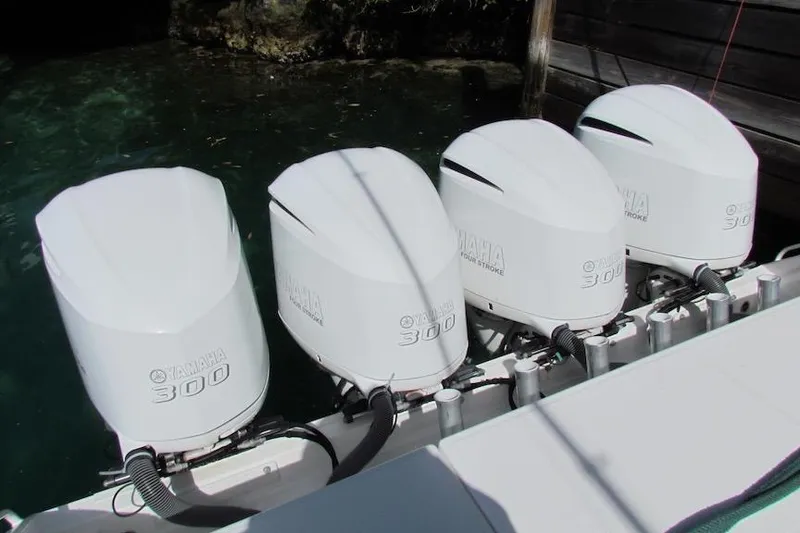Slide: The Image of Four Yamaha 300 outboard engines on a 2016 Everglades 435 Center Console boat. - 19