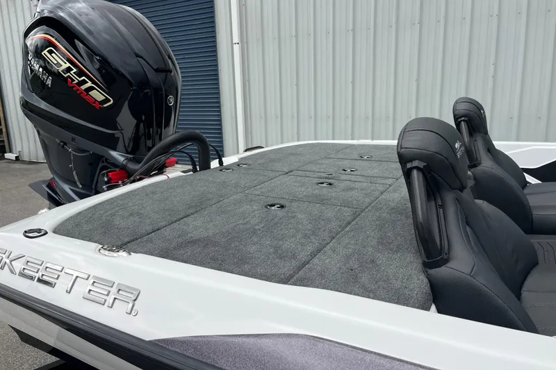 Slide: The Image of 2026 Skeeter ZXR21 SE boat with Yamaha VMAX engine, featuring spacious seating and storage. - 9