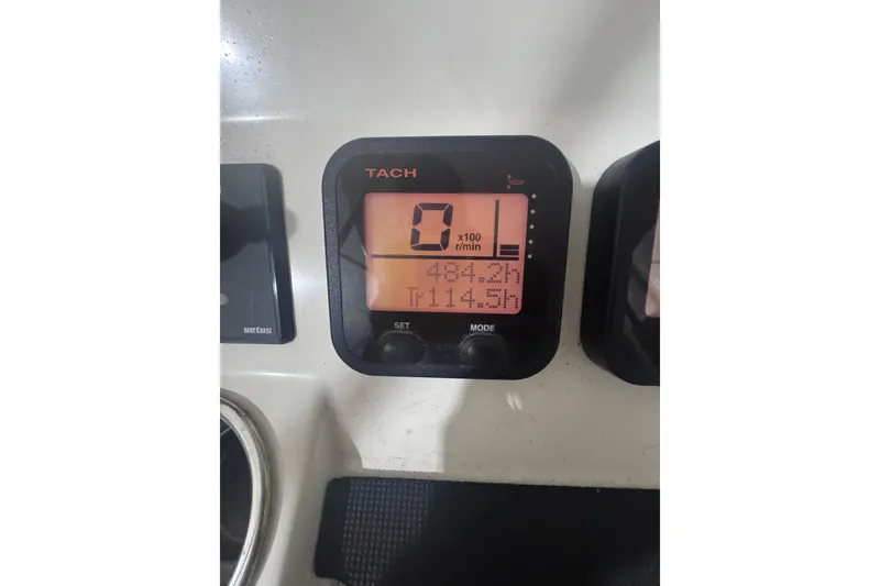 Slide: The Image of Tachometer display on 2010 Regulator 34SS boat, showing engine hours and RPM. - 29