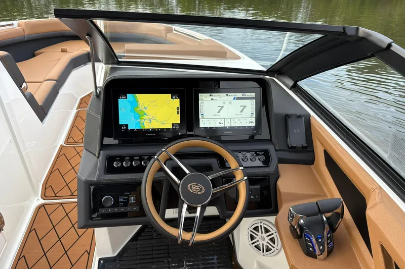 Slide: The Image of 2026 Cobalt R8 Outboard dashboard with dual screens and modern steering wheel. - 11