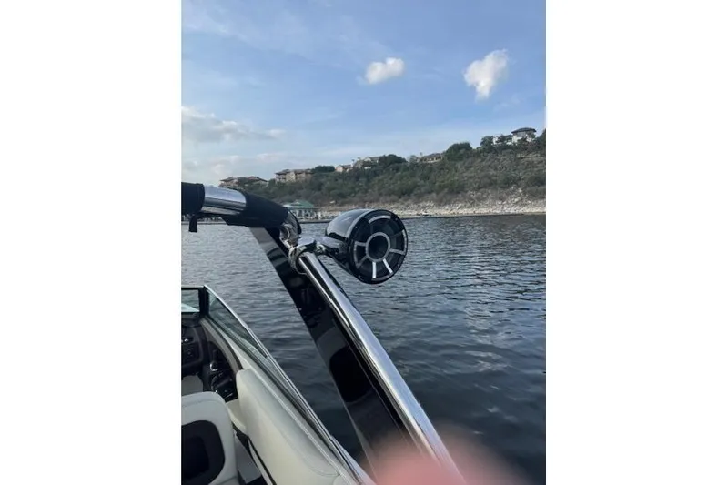 Slide: The Image of 2017 Cobalt R30 boat on water with speaker, scenic background. - 10