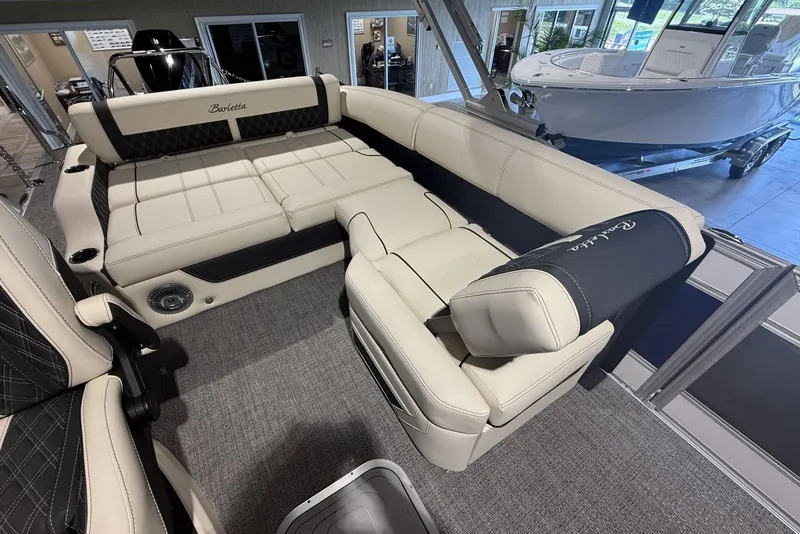 Slide: The Image of Luxurious interior of 2026 Barletta Lusso 23U pontoon boat with plush seating. - 11