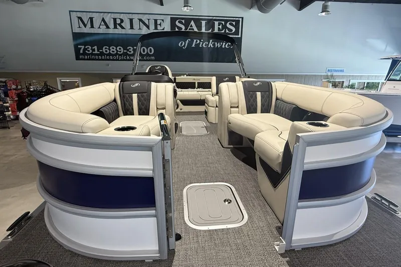 Slide: The Image of 2026 Barletta Lusso 23U pontoon boat with luxurious seating in showroom. - 16