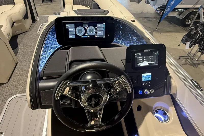 Slide: The Image of 2026 Barletta Lusso 23U dashboard with advanced navigation displays and luxurious steering wheel. - 5
