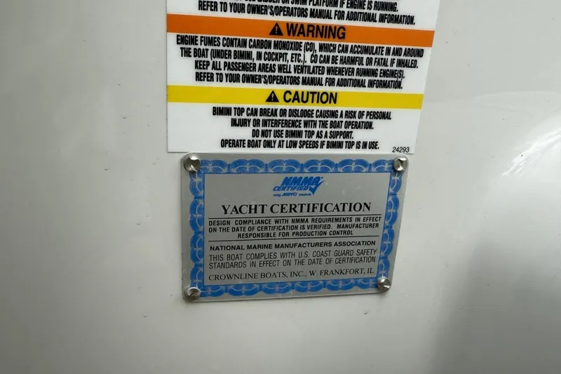 Slide: The Image of 2005 Crownline 288 BR yacht certification and safety warning labels. - 7