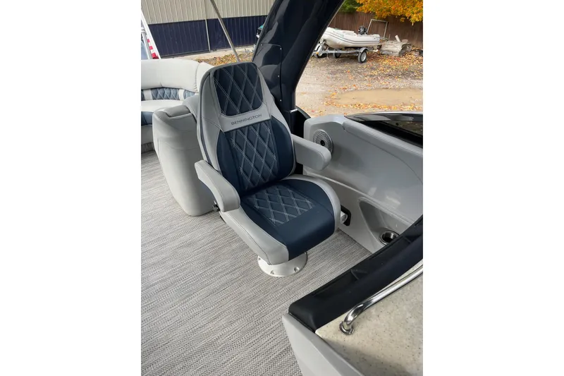 Slide: The Image of Luxurious seating on 2021 Bennington 27 QXFBWAX2 boat, featuring elegant design and comfort. - 11
