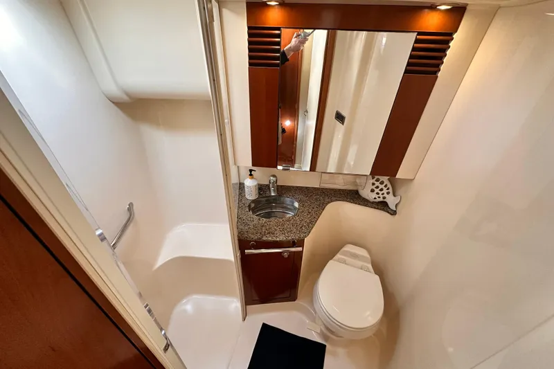 Slide: The Image of Luxurious bathroom in 2005 Sea Ray 420 Sedan Bridge yacht with modern amenities. - 21