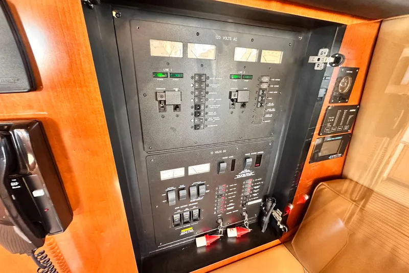 Slide: The Image of Electrical control panel on a 2005 Sea Ray 420 Sedan Bridge yacht. - 23
