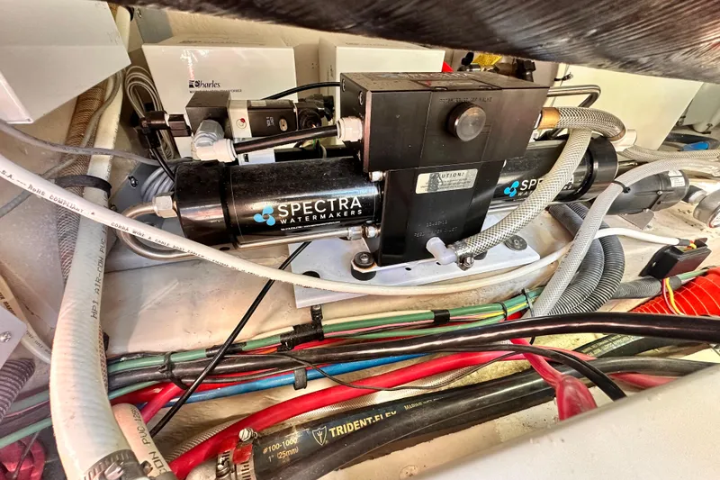 Slide: The Image of Engine room of 2005 Sea Ray 420 Sedan Bridge with Spectra watermaker system. - 24