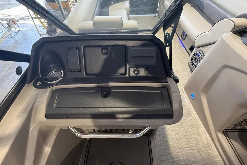 Slide: The Image of 2021 Premier 270 S-Series RF boat interior with dashboard and seating area. - 15