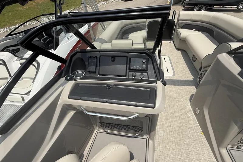 Slide: The Image of 2021 Premier 270 S-Series RF boat interior with modern dashboard and seating. - 4