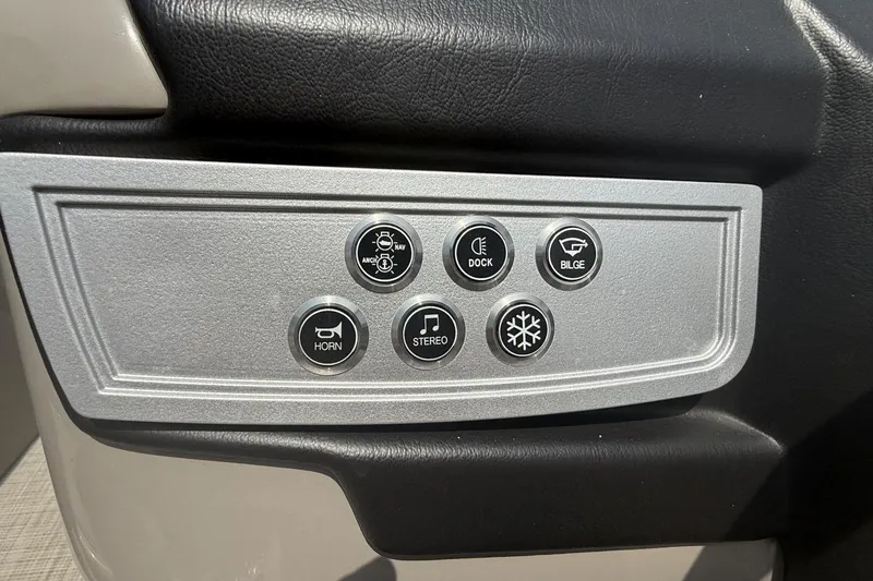 Slide: The Image of Control panel of 2021 Premier 270 S-Series RF boat with various function buttons. - 6