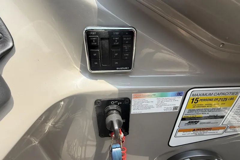 Slide: The Image of Control panel and capacity label on 2021 Premier 270 S-Series RF boat. - 8