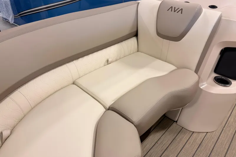 Slide: The Image of 2025 Avalon LSZ Versatile Rear Lounge with elegant beige seating and cup holder. - 10
