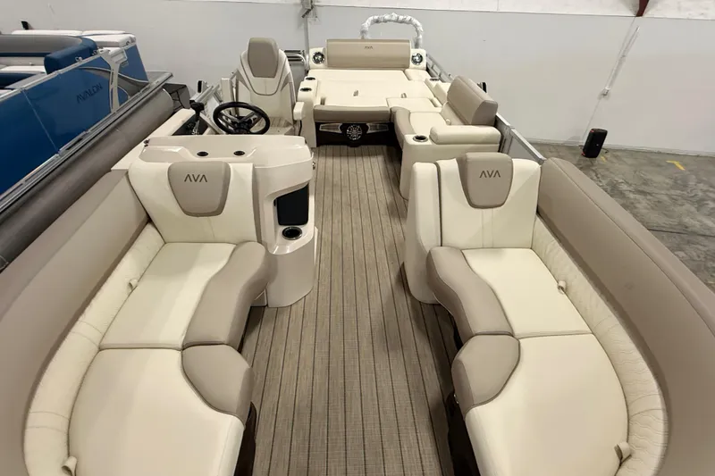 Slide: The Image of 2025 Avalon LSZ Versatile Rear Lounge boat interior with luxurious seating and modern design. - 12